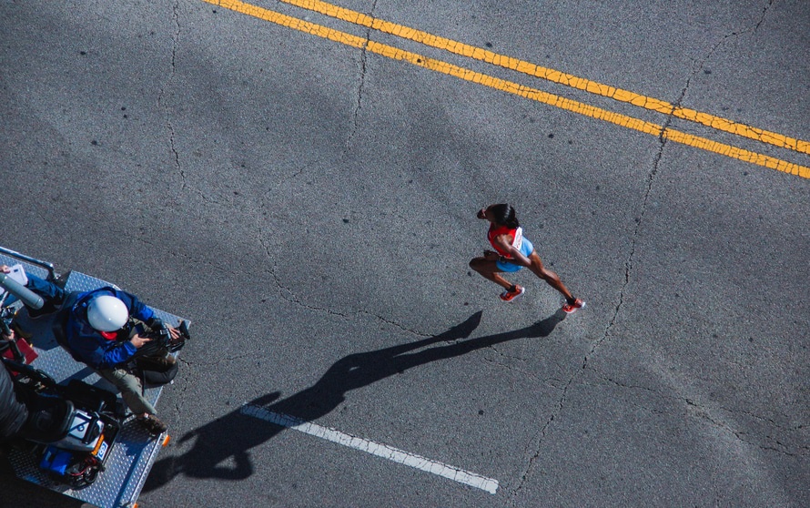 A person running during athletics. Photo by: unsplash.com