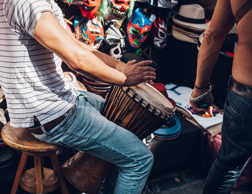 Musician performing on the street. Photo by: Clem Onojeghuo / pexels.com
