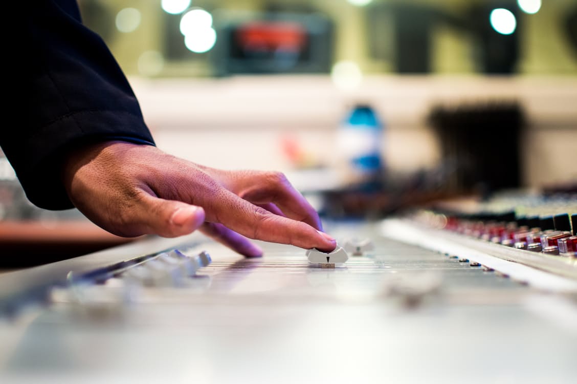 A producer working on music in the studio. Photo by: Pexels.com