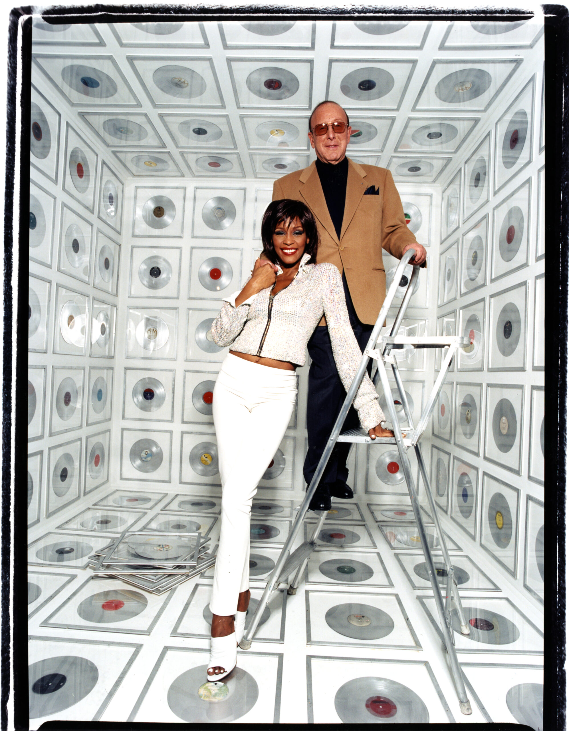 Whitney Houston with Clive Davis. Photo by: David LaChapelle 2000
