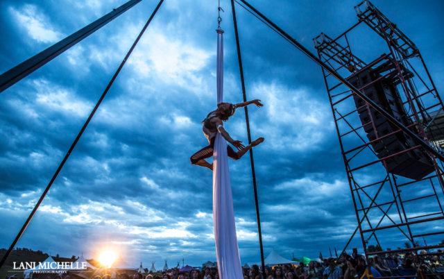 Aerial performer at ARISE Music Festival. Photo by: Lani Michelle Photography. Photo provided by: ARISE Music Festival Aerial performer at ARISE Music Festival. Photo by: Lani Michelle Photography. Photo provided by: ARISE Music Festival