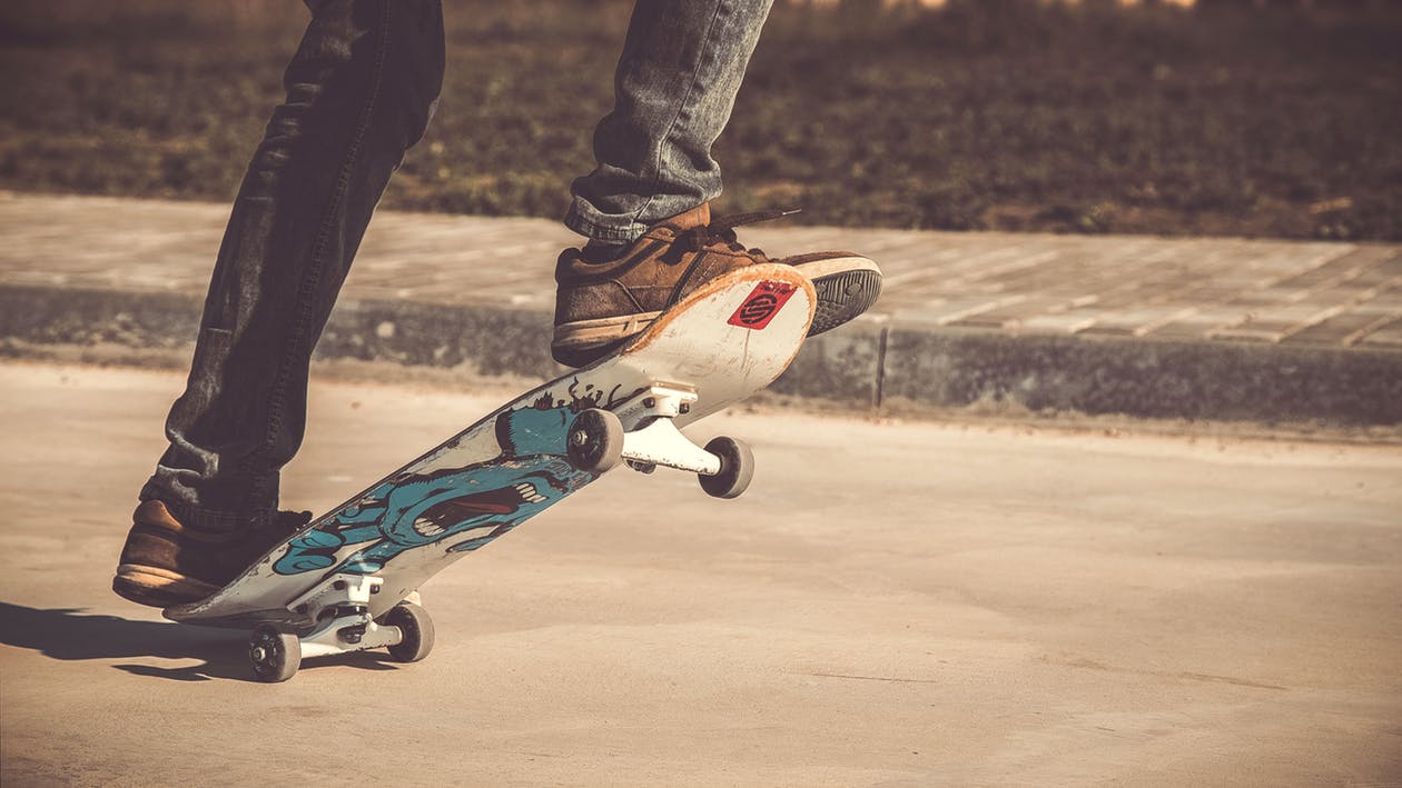 A skateboard rolling down the road. Photo by: Pexels.com