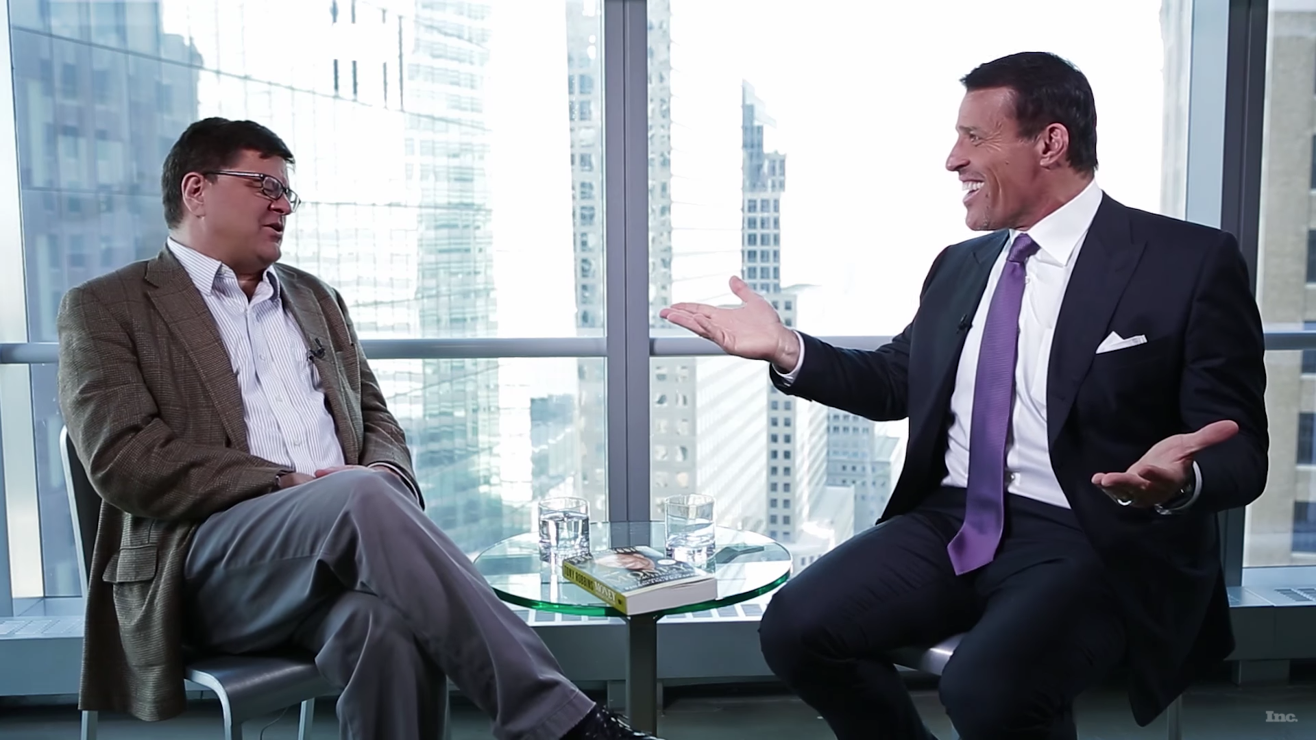 Tony Robbins speaking to Inc. editor James Ledbetter. Photo by: Inc. / YouTube