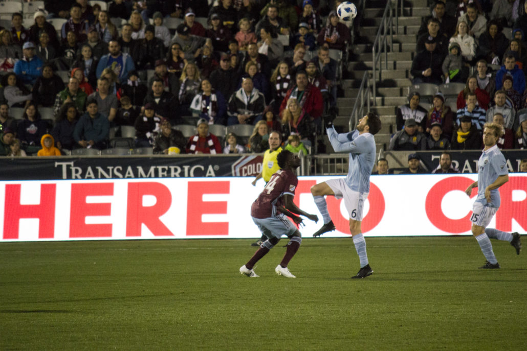 Ilie Sanchez and Marlon Hairston go head-to-head for ball possession. Photo by: Matthew McGuire on 03/24/18 at Dick's Sporting Goods Park
