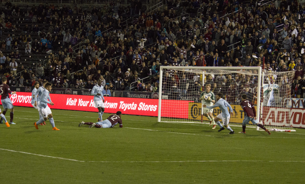 Tim Melia saves a shot on goal during the second half. Photo by: Matthew McGuire on 03/24/18 at Dick's Sporting Goods Park