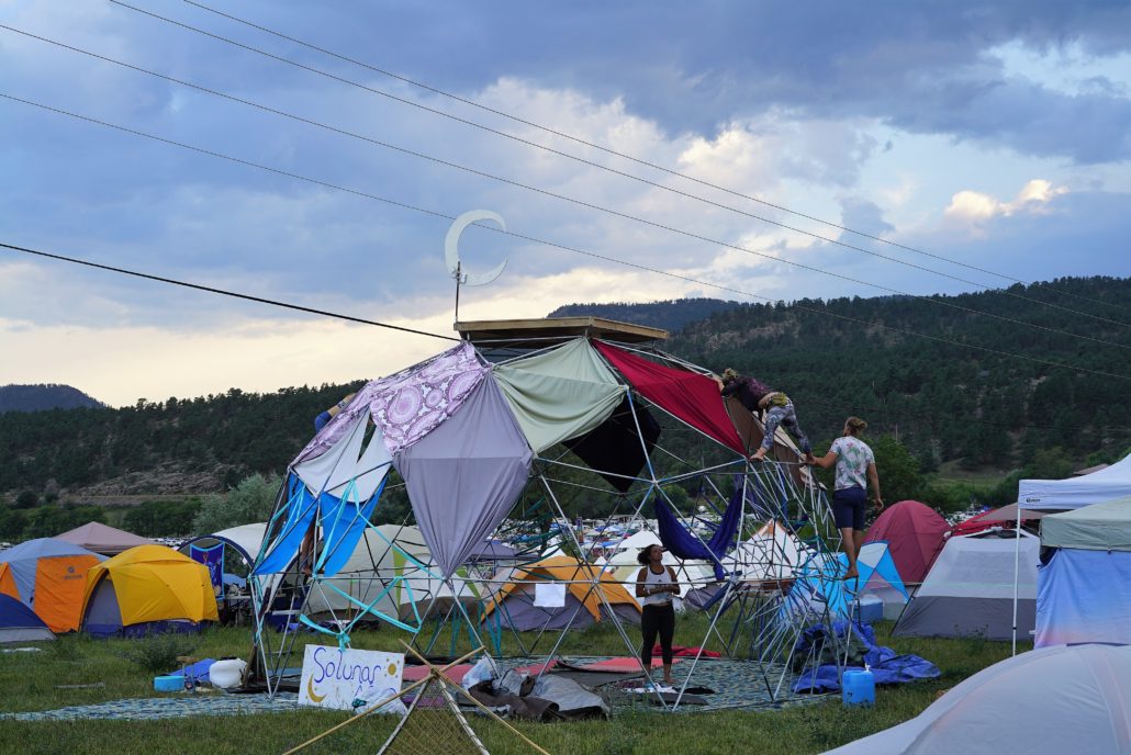 Guests create a geodesic dome and add color to the campgrounds in Loveland, Colorado. Photo by: Samantha Harvey