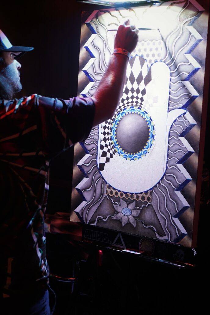 Nick Scotella painting during the Pre-Party at Cervantes' Ballroom in Denver on 01/17/20. Photo by: Samantha Harvey