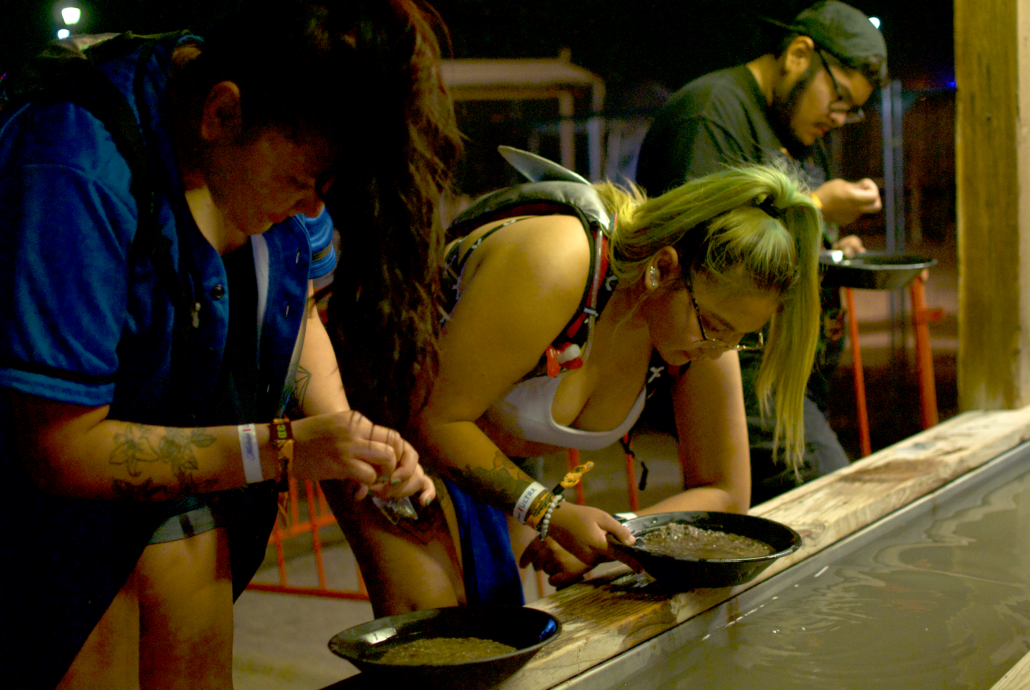 Goldrush attendees pan for gold as part of the festival’s western theme. Photo by Marissa Novel.