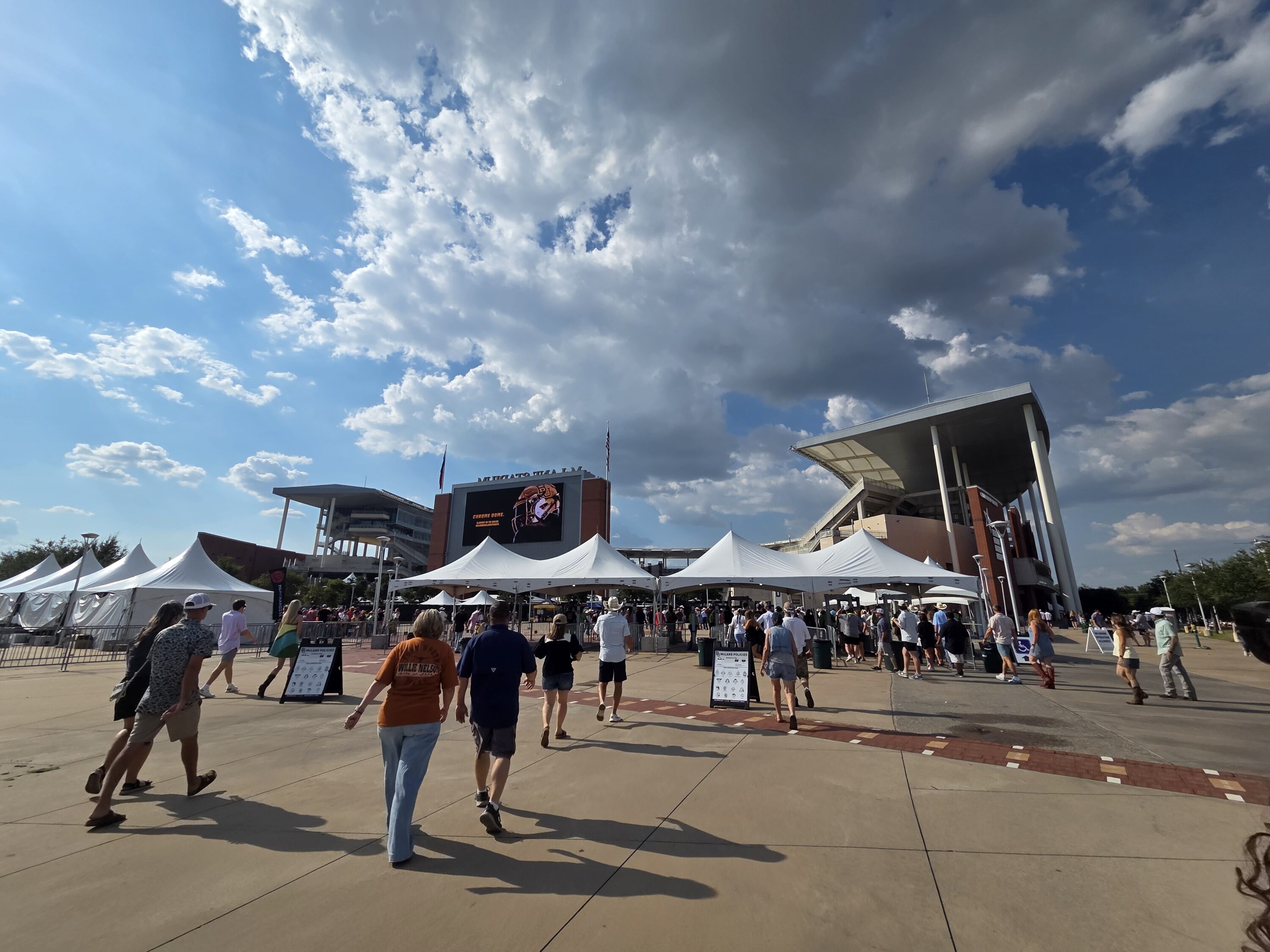 Guests arriving at the Boys from Oklahoma concert at McLane Stadium in Waco, Texas on Saturday, August 23. Photo by: Matthew McGuire