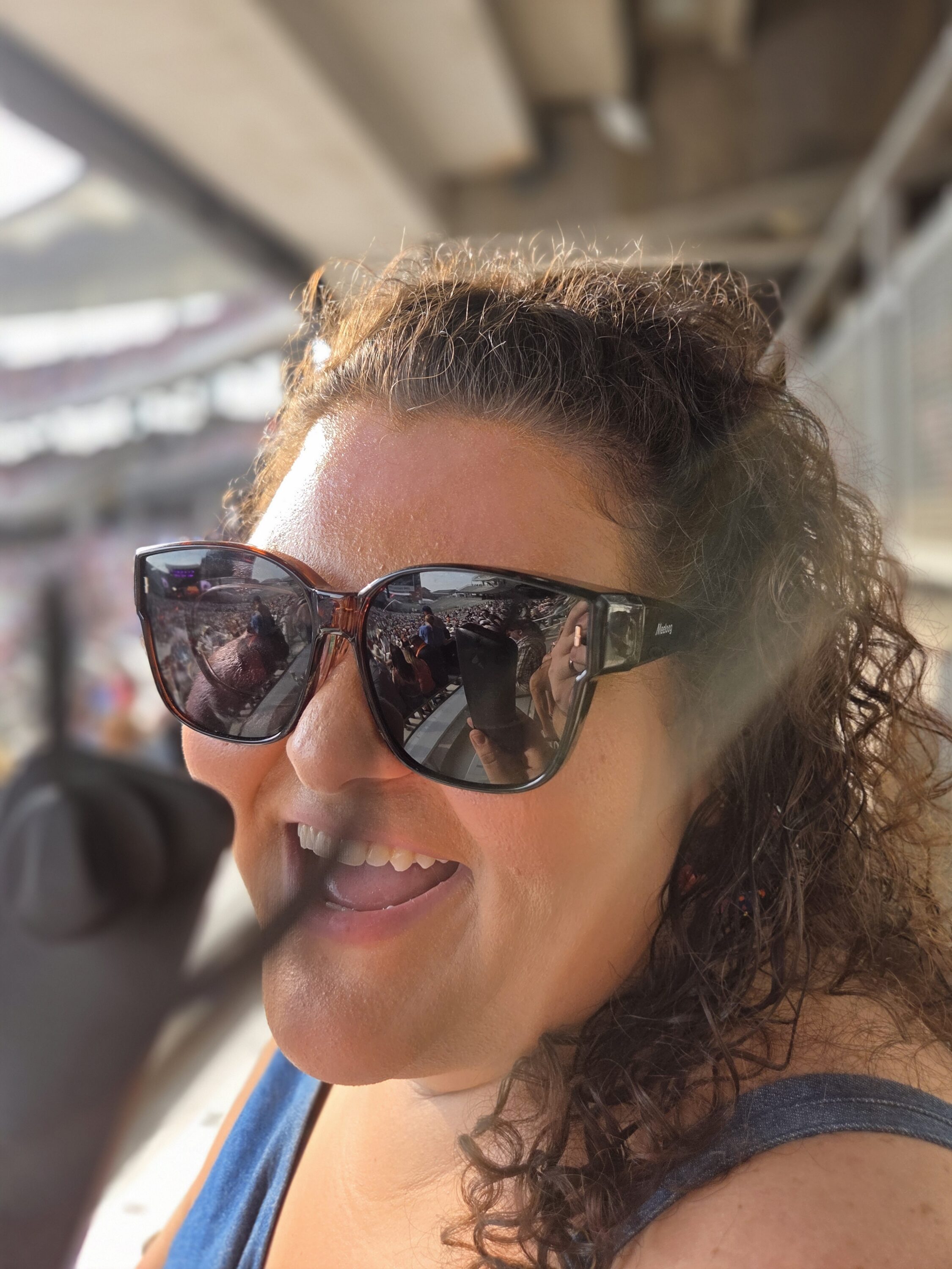 Hannah staying cool at the Boys from Oklahoma concert at McLane Stadium in Waco, Texas on Saturday, August 23. Photo by: Matthew McGuire